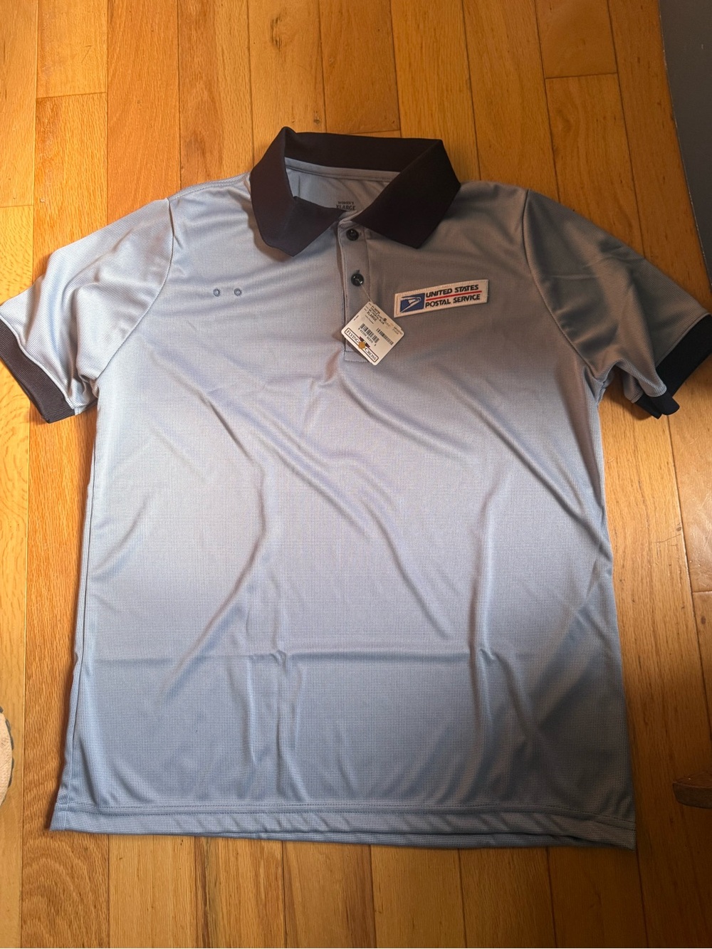 New with tags.  Usps women’s clerk shirt size xl
